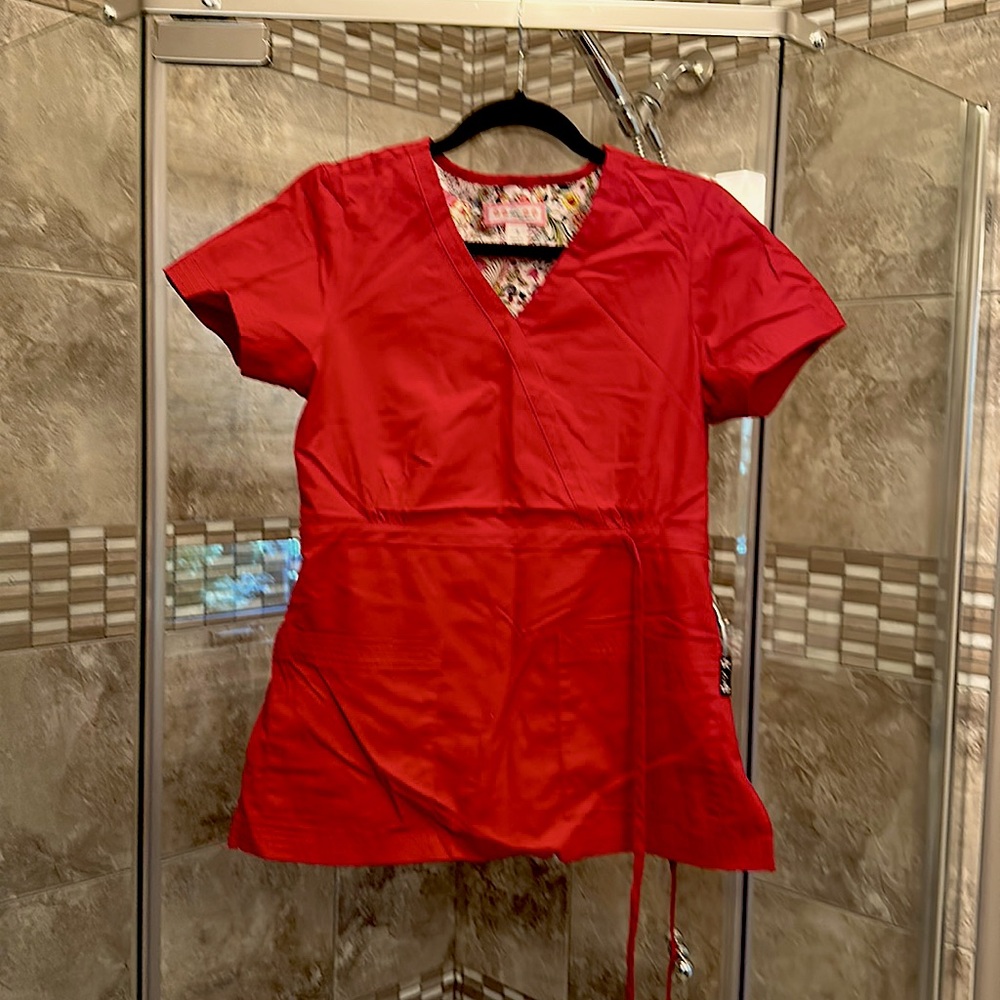 Koi nursing scrub top. Size small